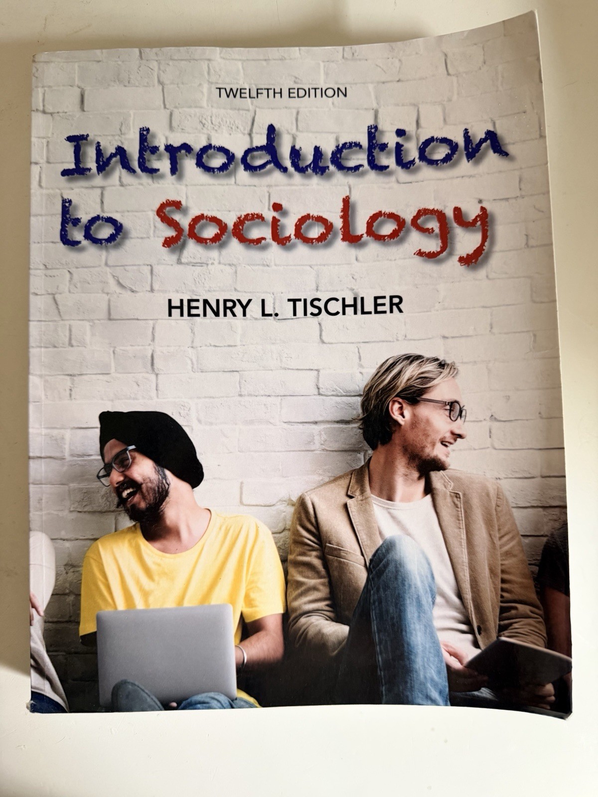 Introduction to Sociology 12th Edition Paperback Textbook by Henry L. Tischler