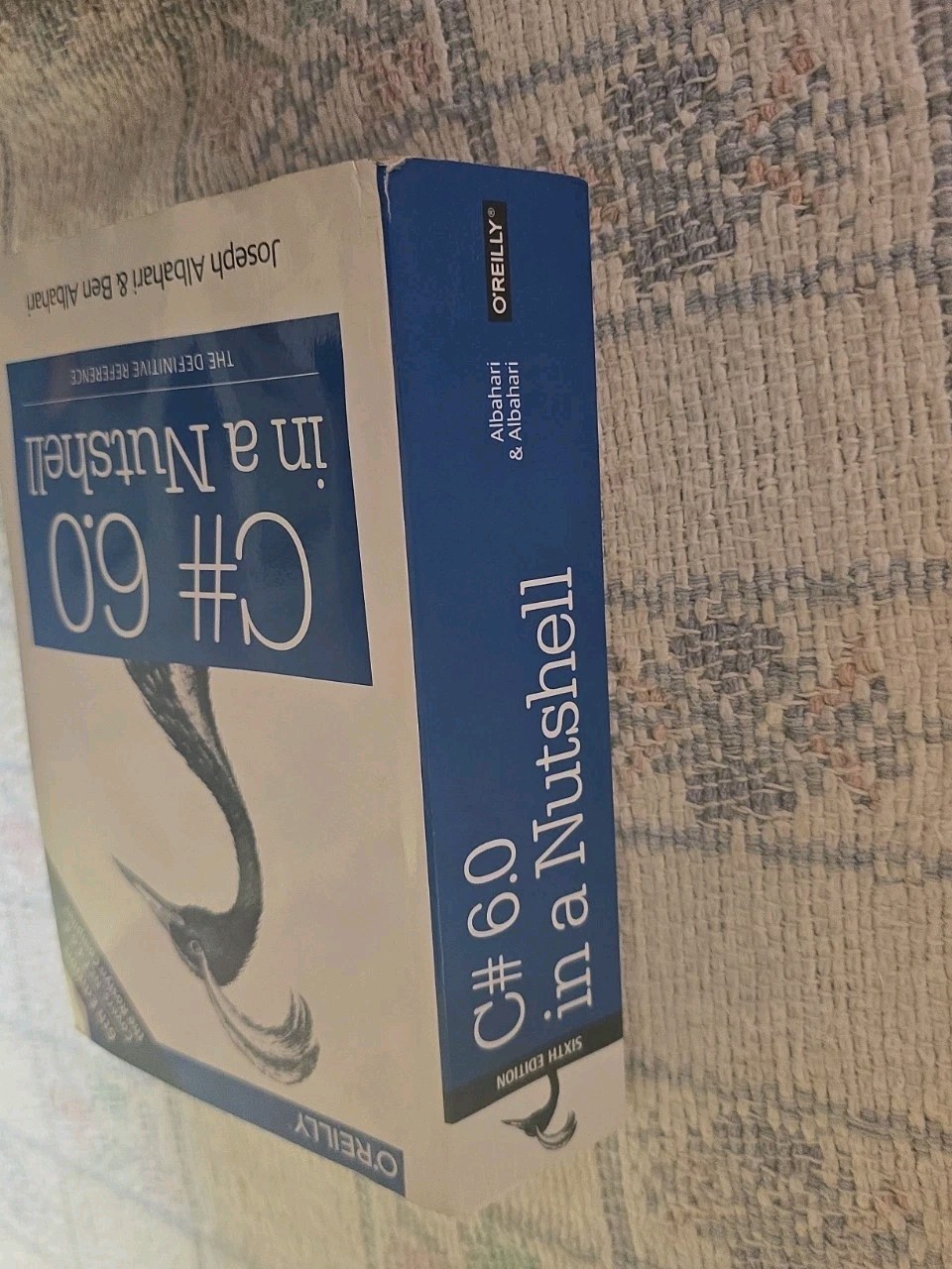 C# 6. 0 in a Nutshell : The Definitive Reference by Joseph Albahari and Ben…