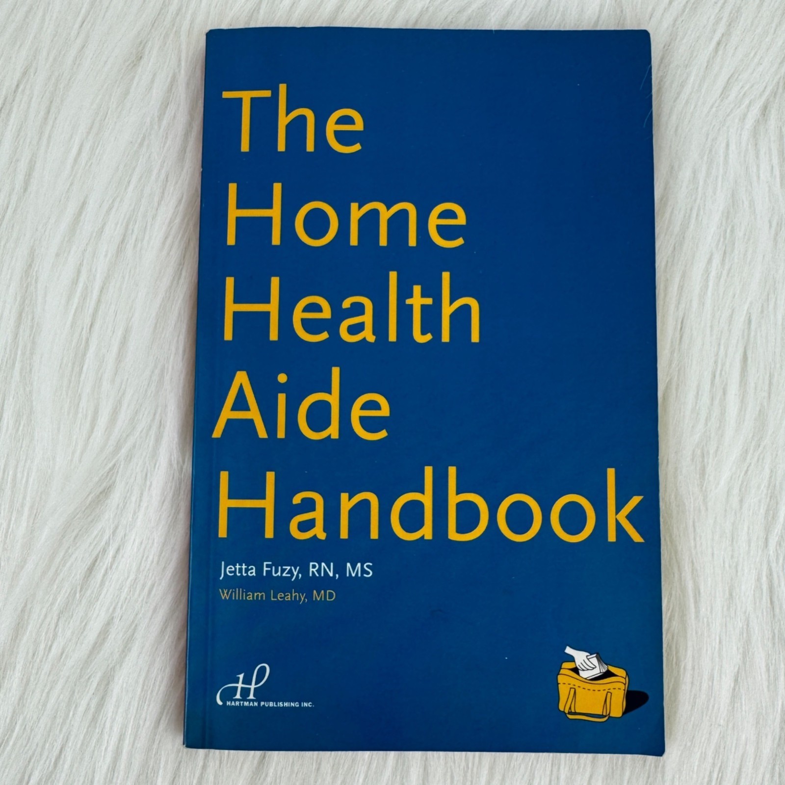 The Home Health Aide Handbook Jenna Fuzy RN, MS William Leahy MD Used Book
