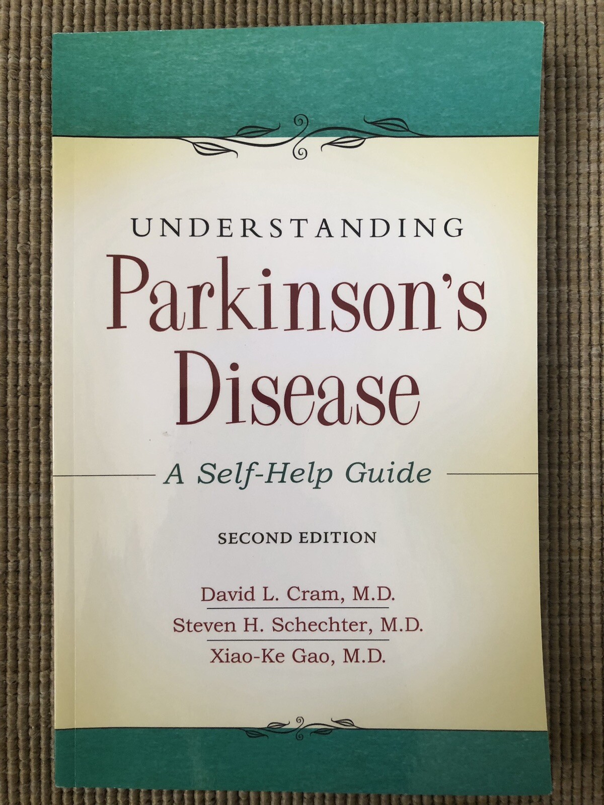 Understanding Parkinson’s Disease : A Self-Help Guide by Xiao Gao, Steven Schech