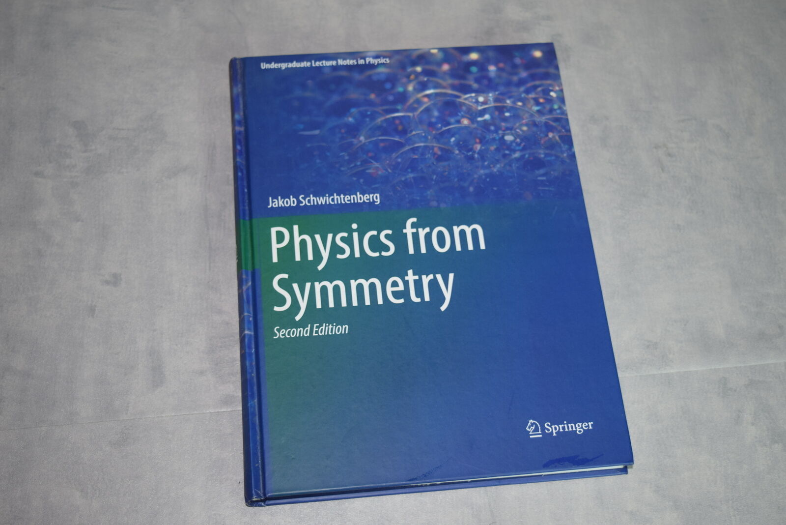 NEW Physics from Symmetry by Jakob Schwichtenberg (HC, 2017, 2nd Ed)